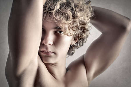 Handsome boy with big musclesの写真素材