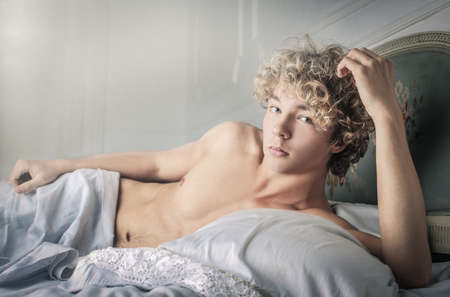 Handsome young man with curly hair