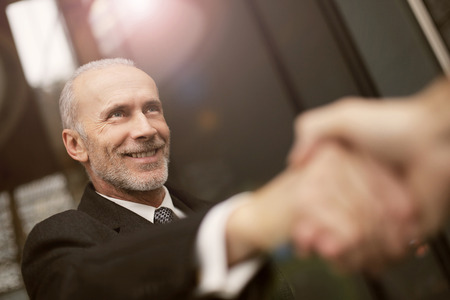 Businessman are shaking handsの写真素材