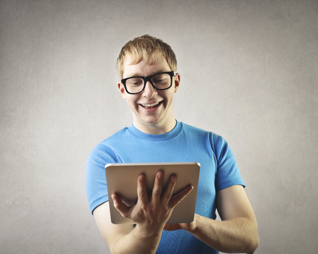 Student learning is on his tabletの写真素材