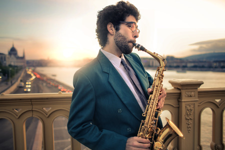 Playing music on the bridgeの写真素材