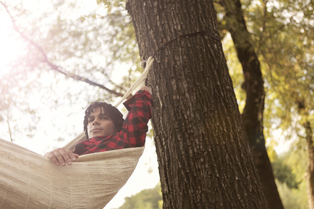 Relax in a hammockの写真素材