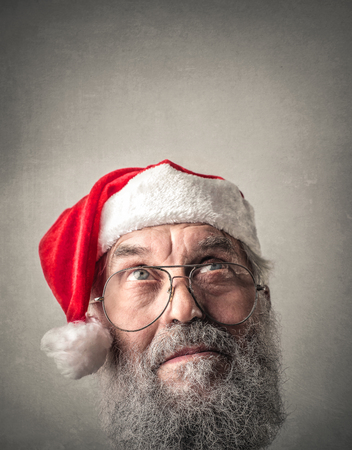 Old man in Santa hatの写真素材