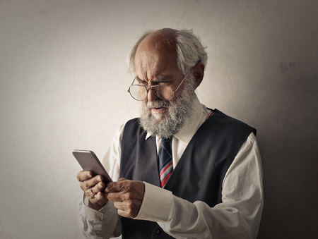 Old Man Trying To Understand also his phone
