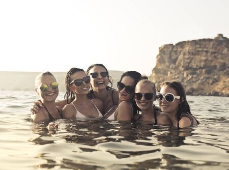 Happy girls in the seaの写真素材