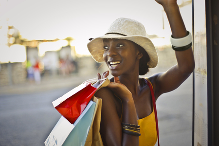 Smiling black woman is shoppingの写真素材