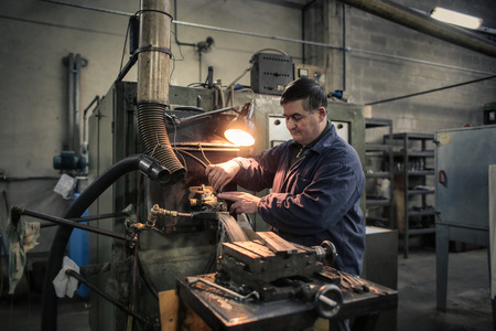 Industrial workman in the factory