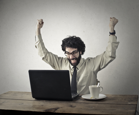 Businessman has some success with his workの写真素材