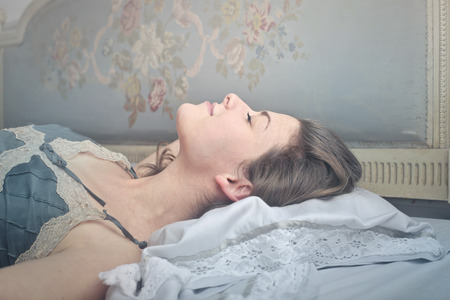 Brunette girl is sleepingの写真素材