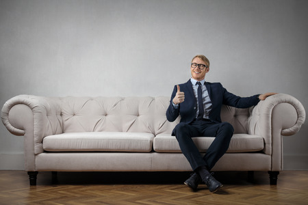 Feeling great on the sofaの写真素材