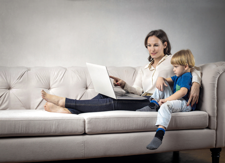 Mom and son the sofaの写真素材