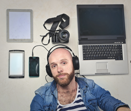 Bold guy is listening to music