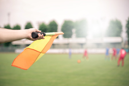 playing football in the stadium