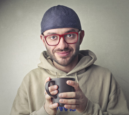 Man with a cup of teaの写真素材