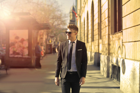 Handsome businessman on the streetの写真素材