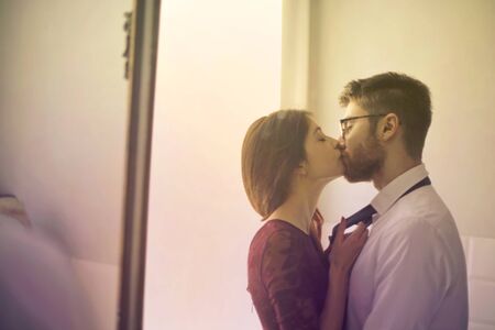 Young couple is kissingの写真素材