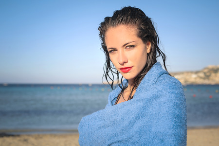 Woman in a towel at the sea