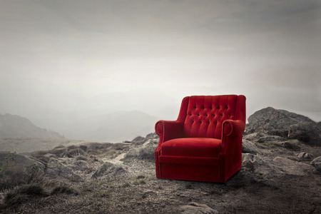 The red armchair in the mountains