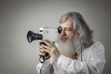 Old man with an old filmmaker