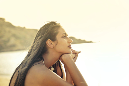 Girls also thinking at the seaの写真素材