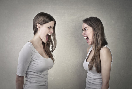 Girls are screaming at each otherの写真素材