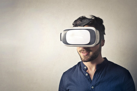 Man is wearing a virtual simulatorの写真素材