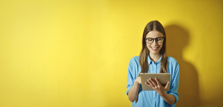 Girl using a tabletの写真素材