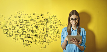 Girl using a tabletの写真素材