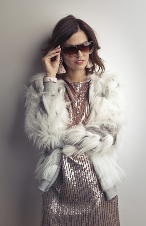 Portrait of an elegant woman with sunglassesの写真素材