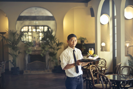 Manervant at work in a hotelの写真素材