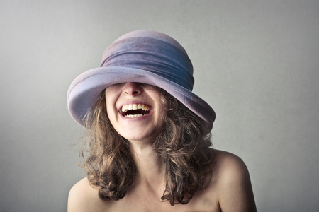 Portrait of a girl with a hatの写真素材