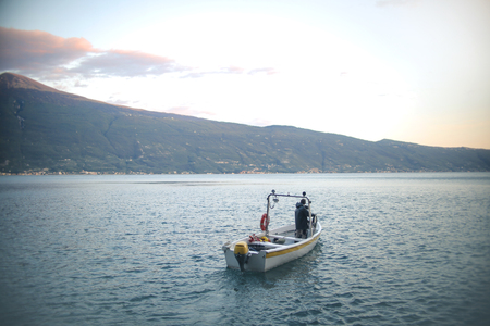 A small boat on a lakeの写真素材