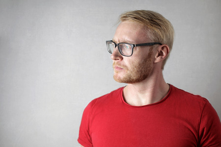 Portrait of a man with a red t-shirtの写真素材