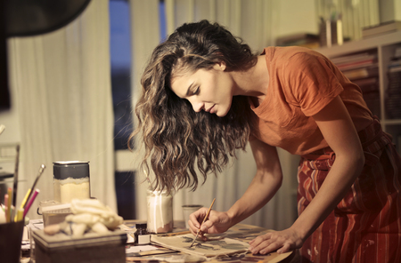 Creative girl at work at homeの写真素材