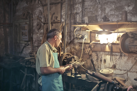 Artisan at work in a laboratoryの写真素材
