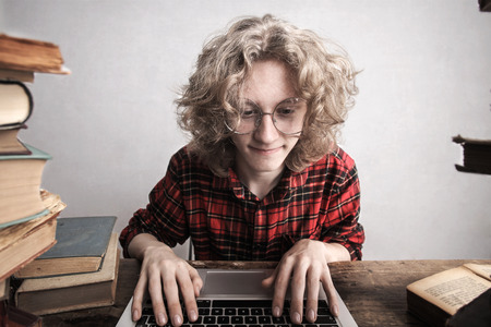 Student boy with a laptop