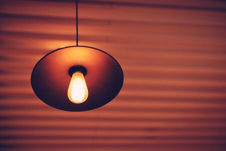 Lamp light in coffeeshop. Make a lowlight