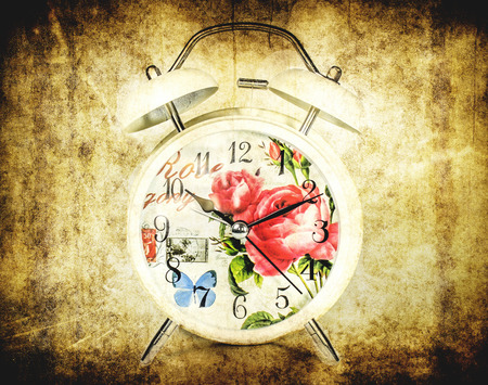 retro style alarm clock in grunge background design