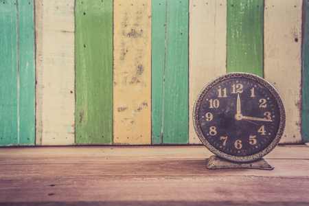 old clock in art retro vintage background designの写真素材
