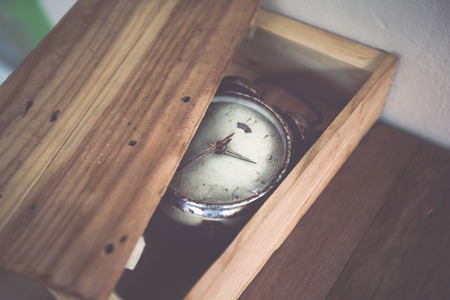 old clock in art retro vintage background designの写真素材