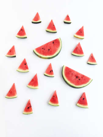 slices of watermelon on white background