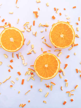 Fresh orange and slices on white background.の写真素材
