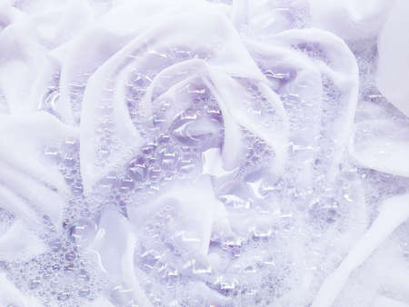 Soak a cloth before washing, white clothの写真素材