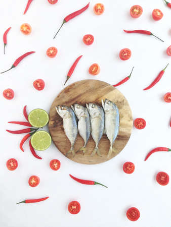short mackerel among lime chili and tomatoの写真素材