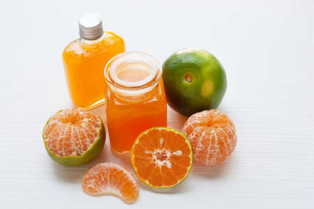 Fresh orange juice on white, Healthy vitamin drink.の写真素材