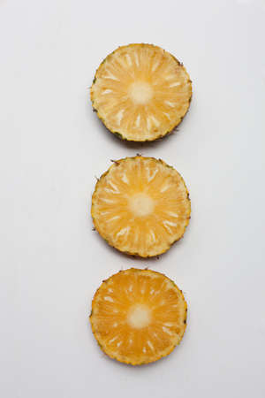 Slices of pineapple  isolated on white background.