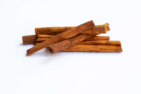 Cinnamon sticks isolated on whiteの写真素材