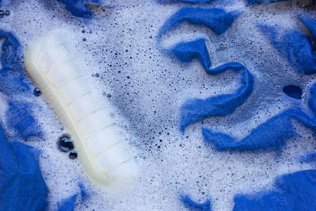 Washing Jeans shirt, soakedの写真素材