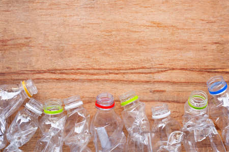 Plastic waste, Plastic bottles on wooden background.の写真素材
