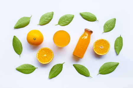Orange with green leaves and Orange juice isolated on white background. Top viewの写真素材